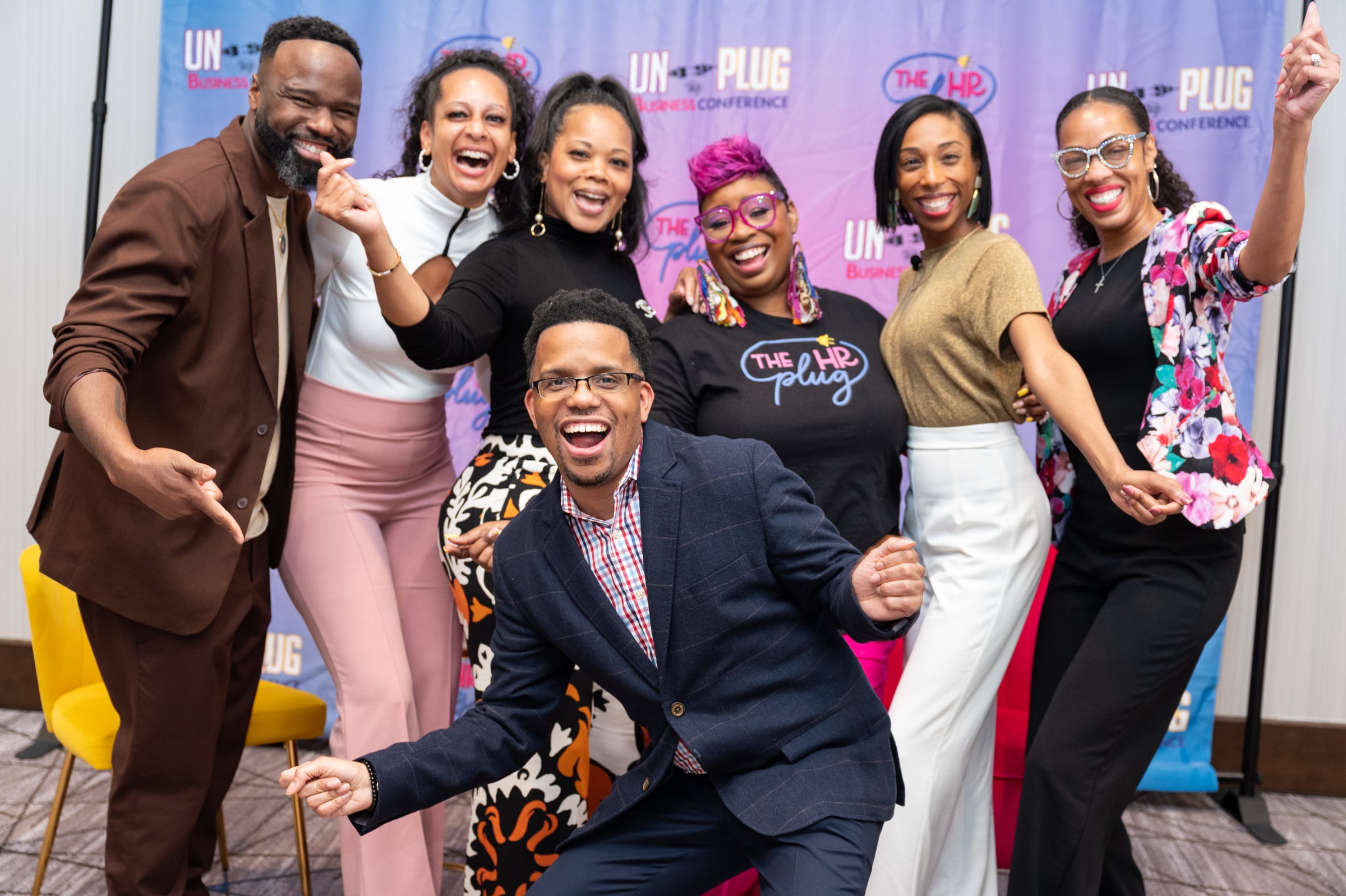 LaShawn Davis with professionals at the UNPLUG leadership conference